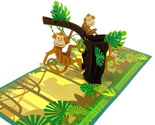 &quot;Monkey-themed pop-up card: A three-dimensional card featuring a creatively designed and intricately crafted pop-up scene with charming monkeys, perfect for a variety of occasions and celebrations.&quot;