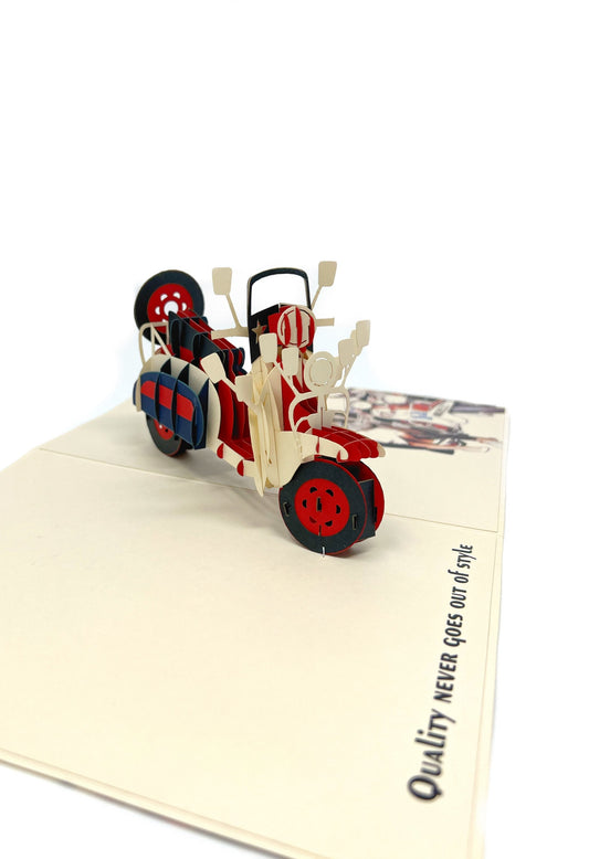 &quot;Scooter-themed pop-up card: A three-dimensional card with an intricately crafted pop-up scene featuring a stylish scooter, perfect for adding a touch of whimsy and adventure to various occasions.&quot;