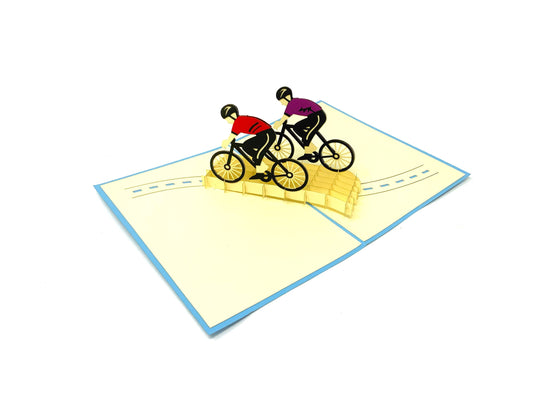 pop-up greeting card featuring a cyclist: A creatively designed card with a three-dimensional cyclist, capturing the spirit of cycling and outdoor adventure.&quot;