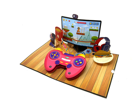 &quot;Gaming console pop-up card: A three-dimensional card displaying a creatively designed pop-up of a gaming console, capturing the essence of video gaming entertainment.&quot;